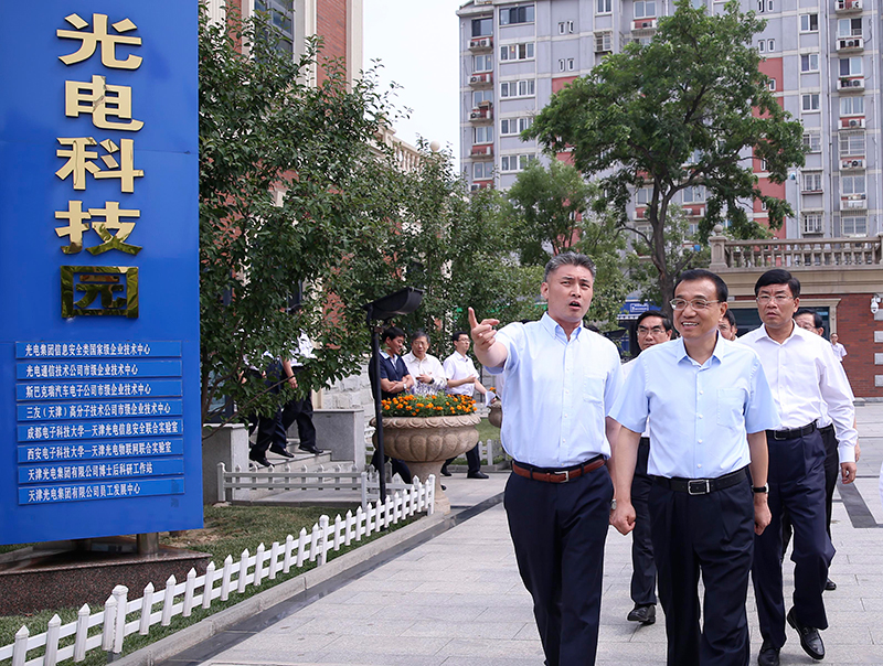 李克強體驗“飛鴿”：我愿為中國自行車做廣告