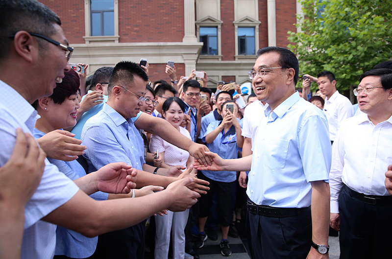 李克強體驗“飛鴿”：我愿為中國自行車做廣告