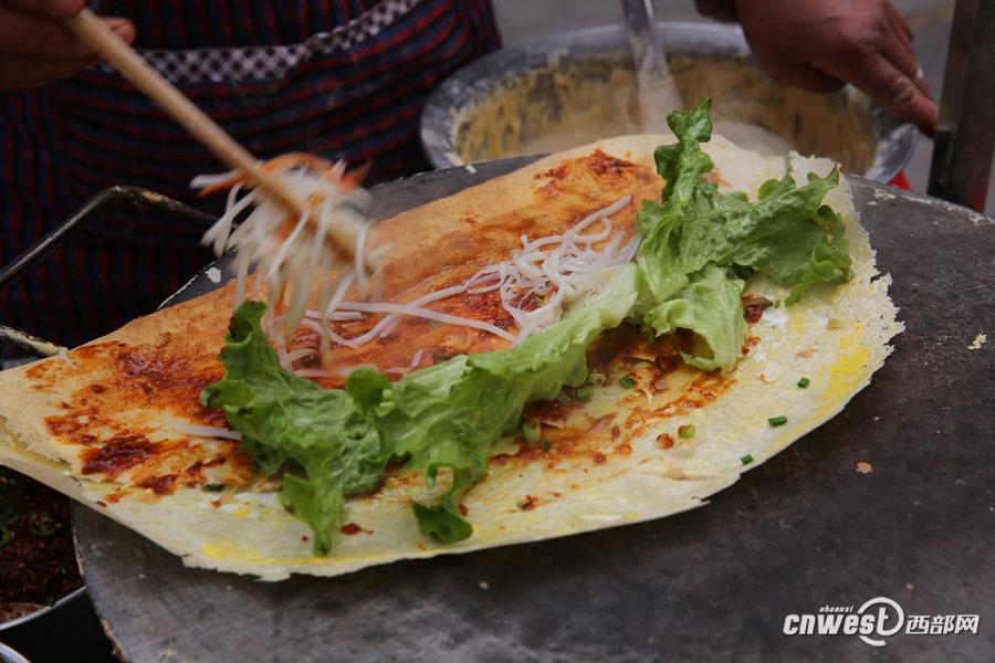 西安煎餅夫妻 9年堅持為特殊群體提供免費煎餅（組圖）