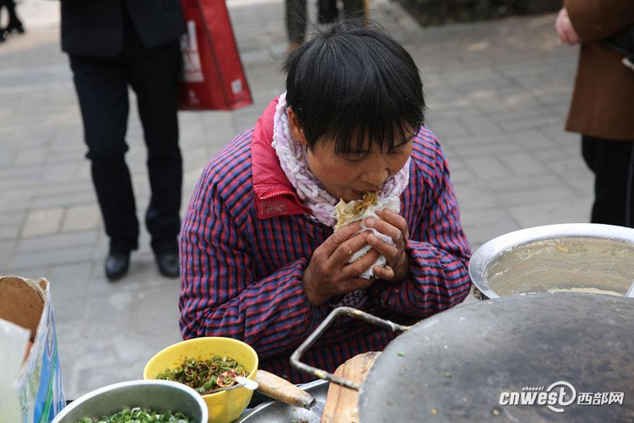 西安煎餅夫妻 9年堅持為特殊群體提供免費煎餅（組圖）