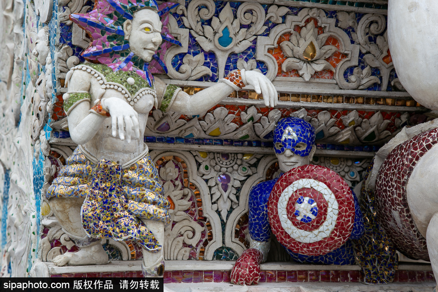 泰國(guó)曼谷一廟宇驚現(xiàn)超人、皮卡丘等動(dòng)漫雕像 跨界裝飾創(chuàng)意無(wú)窮！
